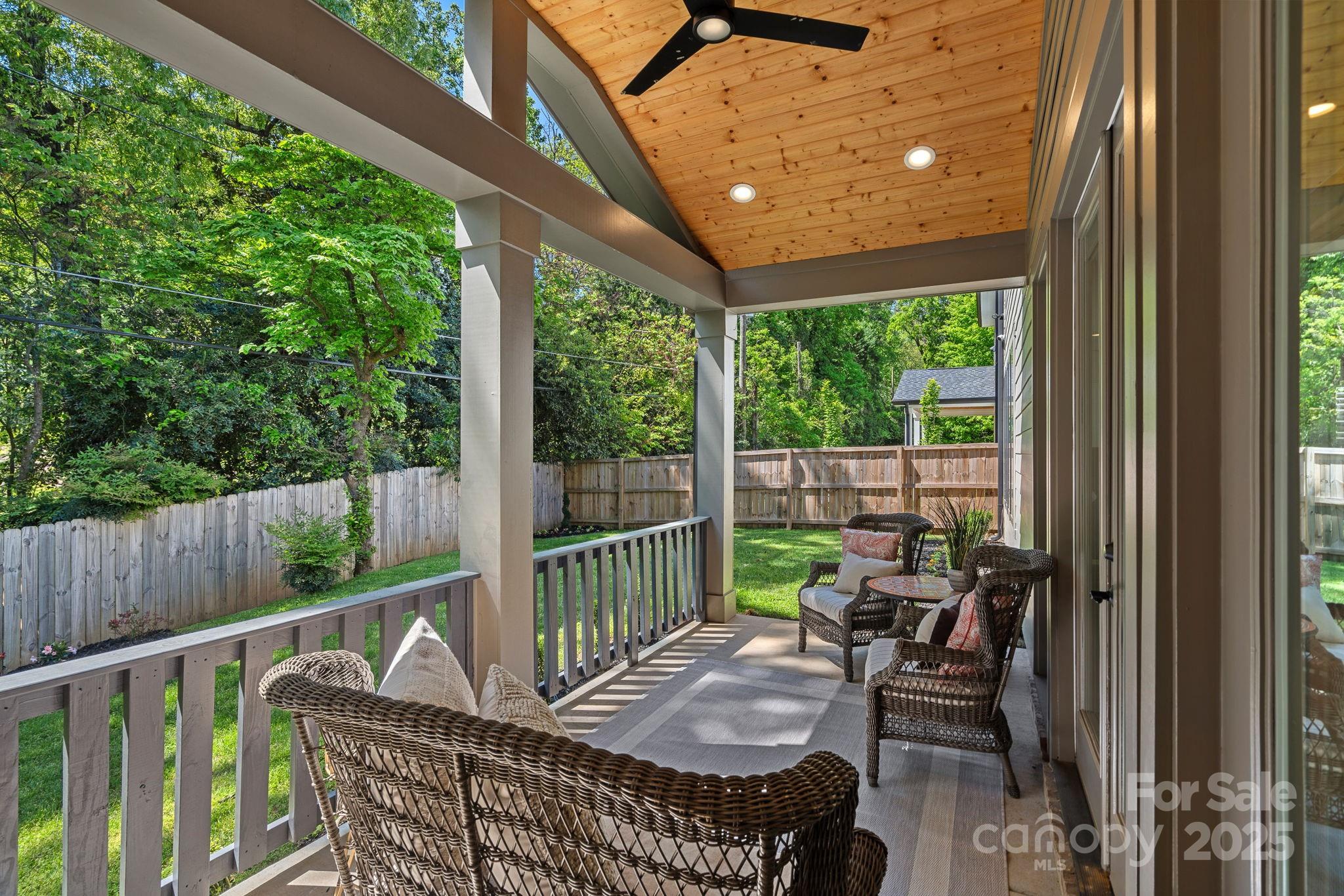 3228 East Ford Road Charlotte, NC 28205 - Photo 28 of 31 a view of a chair and table in the balcony