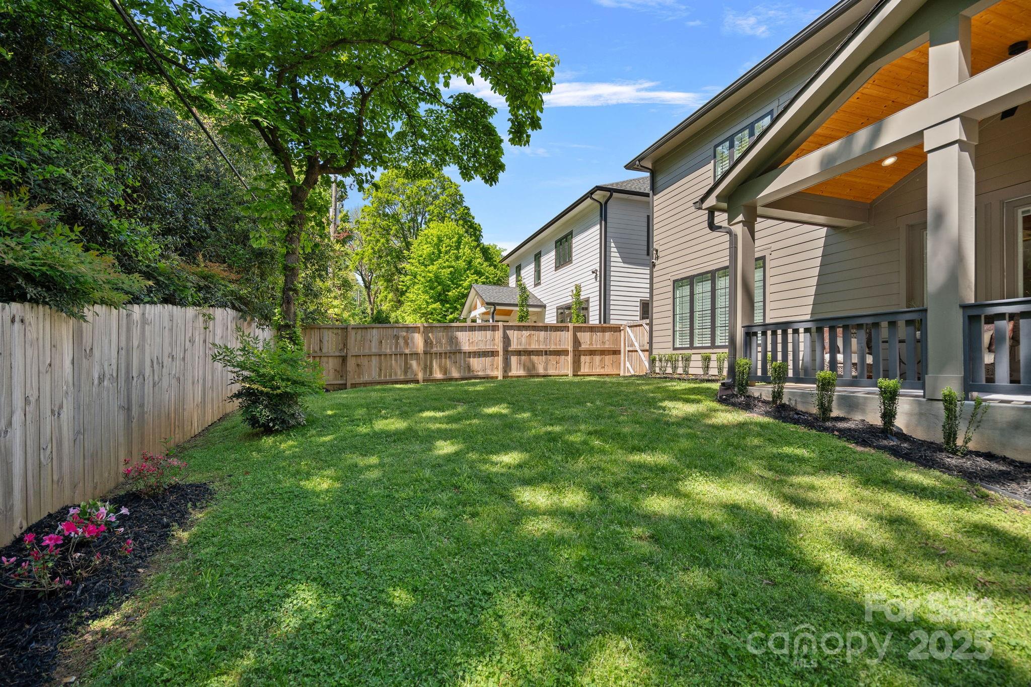 3228 East Ford Road Charlotte, NC 28205 - Photo 30 of 31 a view of backyard with a garden