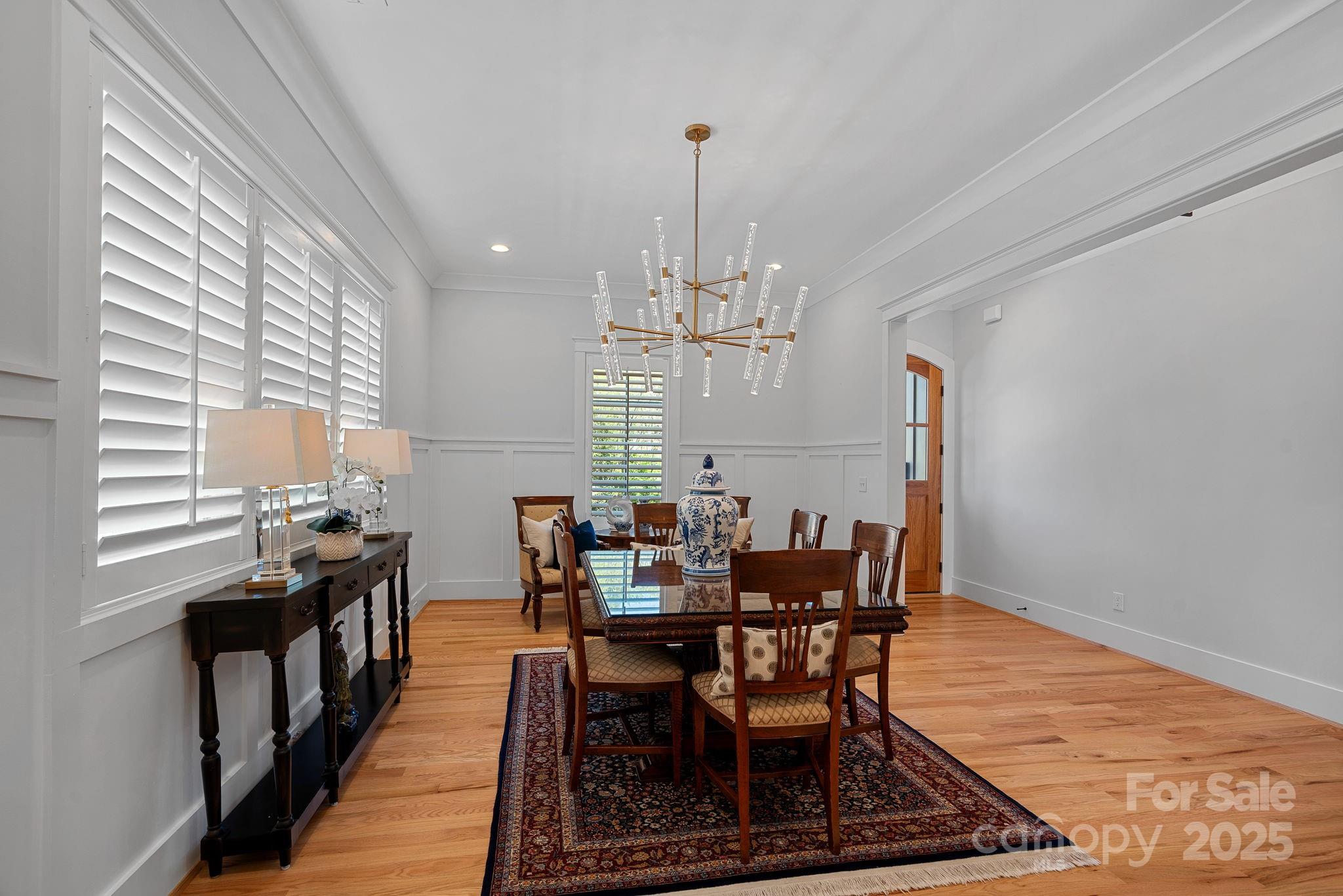 3228 East Ford Road Charlotte, NC 28205 - Photo 8 of 31 a view of a dining room with furniture