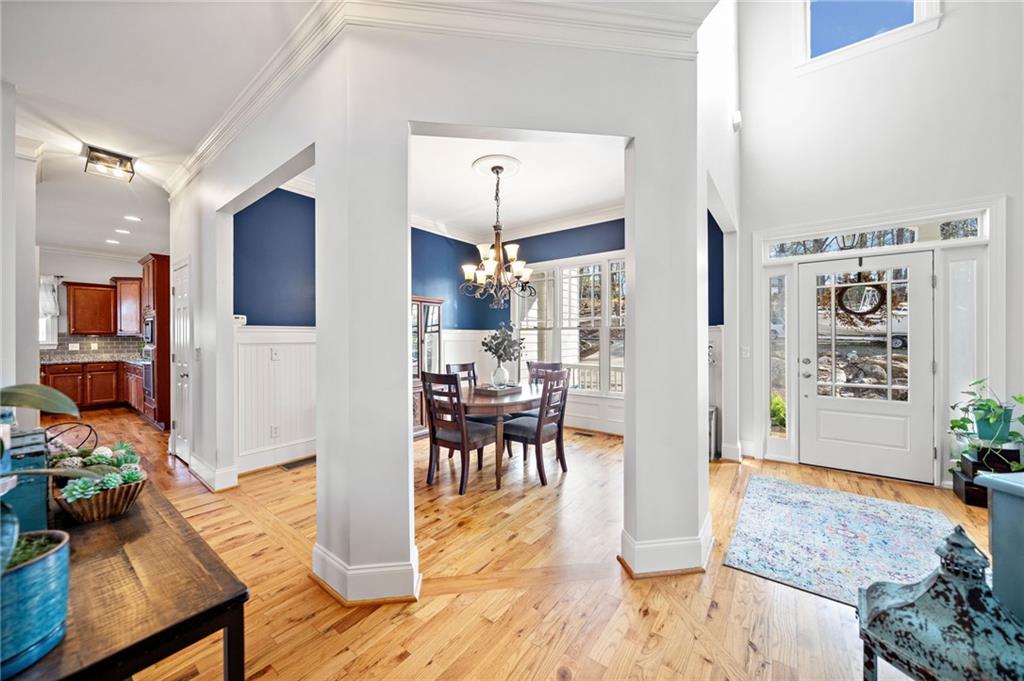 121 Moose Loop Waleska, GA 30183 - Photo 12 of 57 a living room with furniture and wooden floor