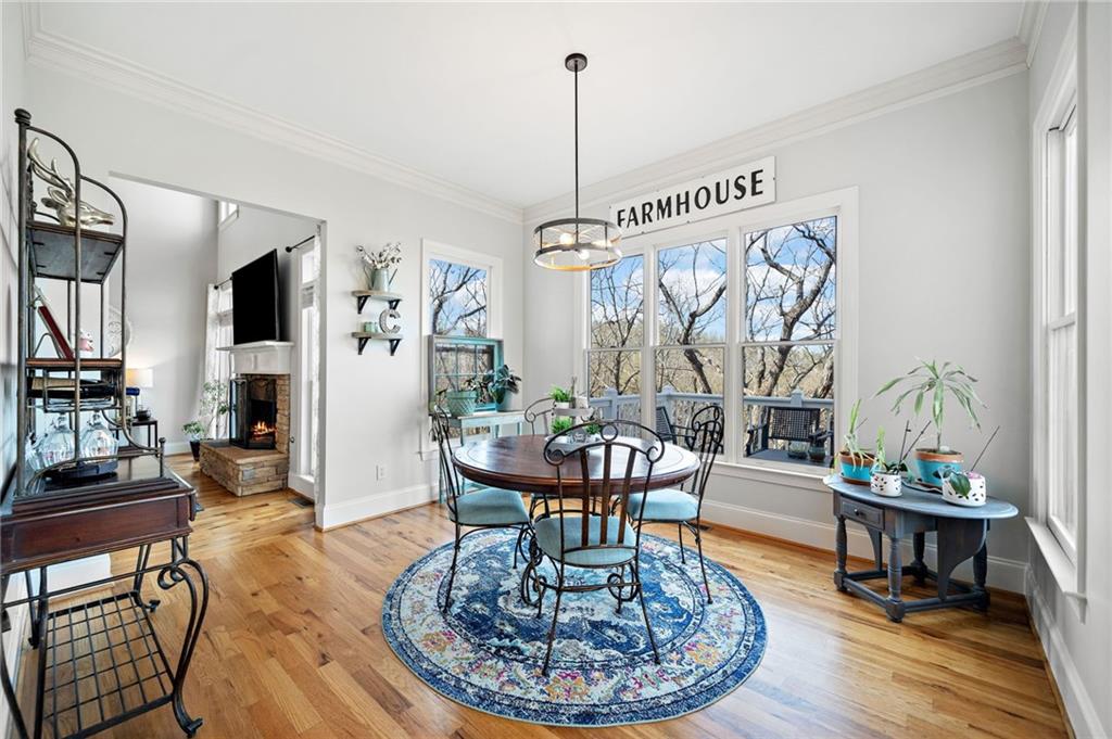 121 Moose Loop Waleska, GA 30183 - Photo 25 of 57 a living room with furniture a lamp and a chandelier