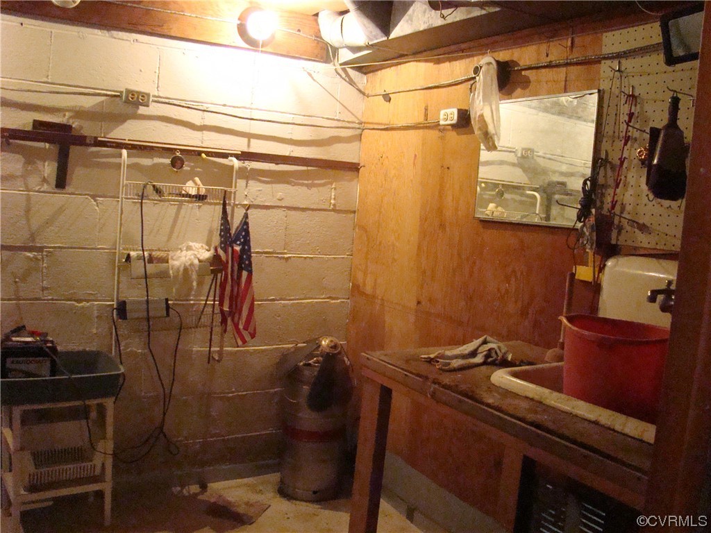 15320 Harrowgate Road Chester, VA 23831 - Photo 20 of 28 a bathroom with a sink and a mirror