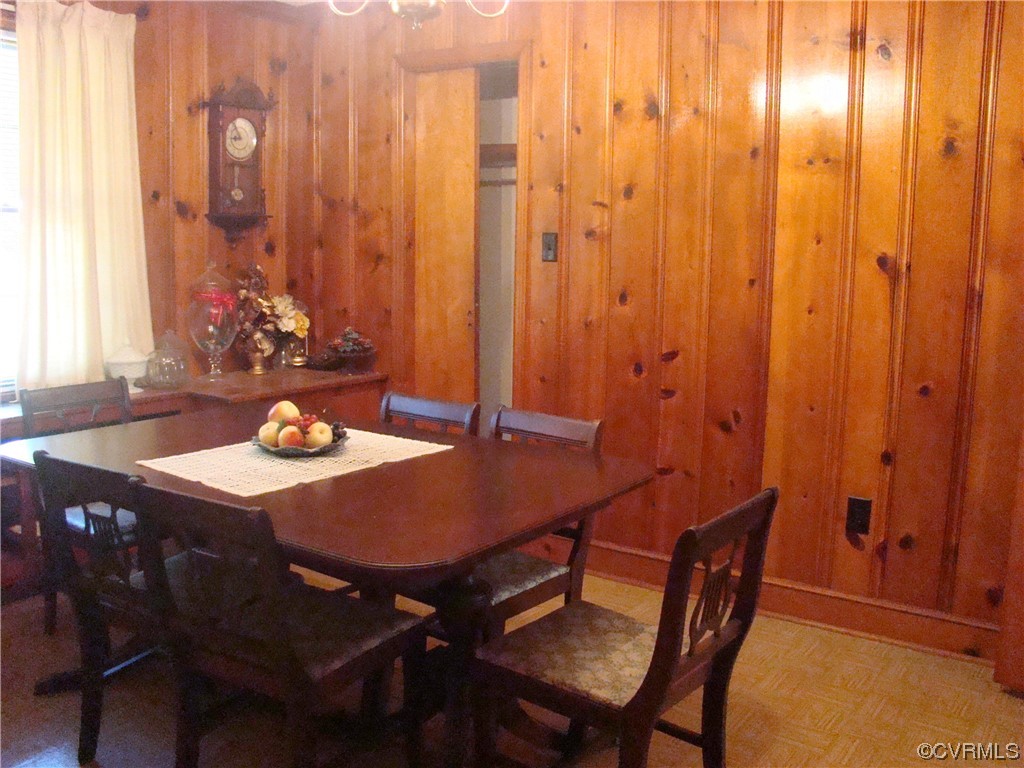 15320 Harrowgate Road Chester, VA 23831 - Photo 10 of 28 a view of a dining table and chairs