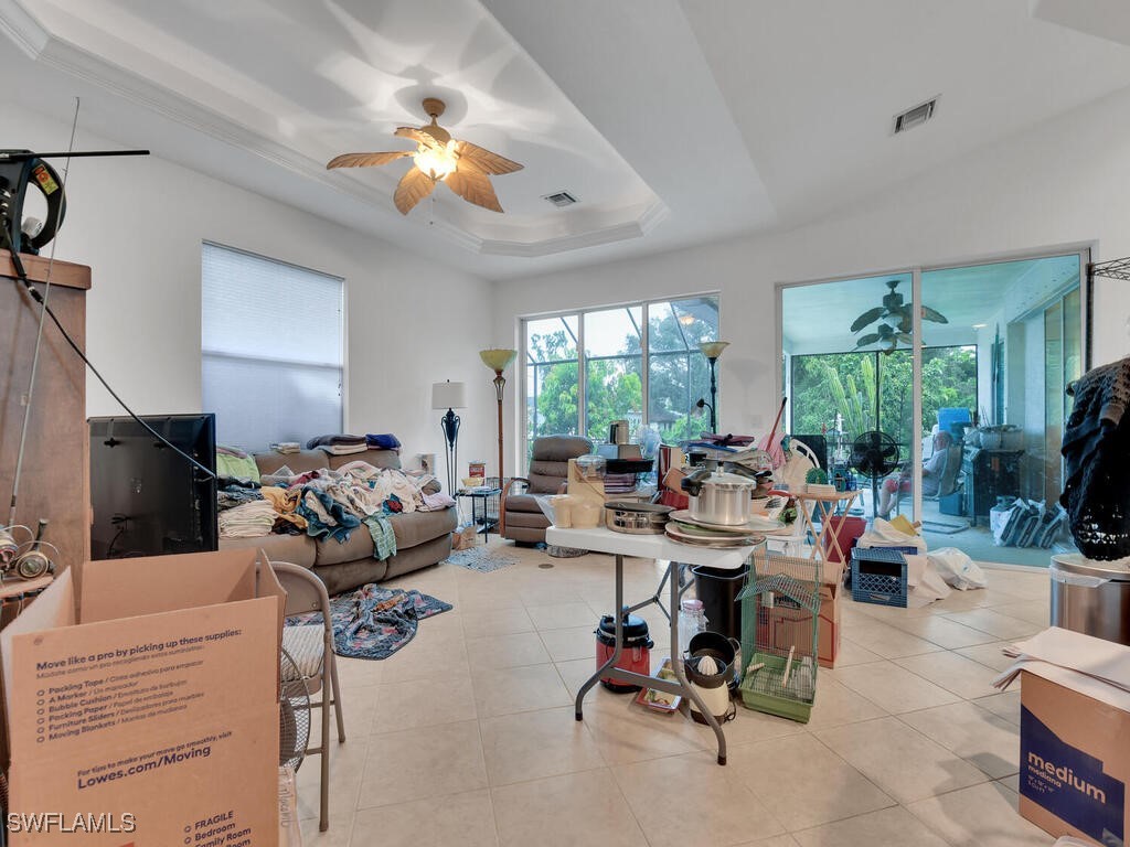 8123 Sandpiper Road Fort Myers, FL 33967 - Photo 11 of 23 a living room with furniture and a large window