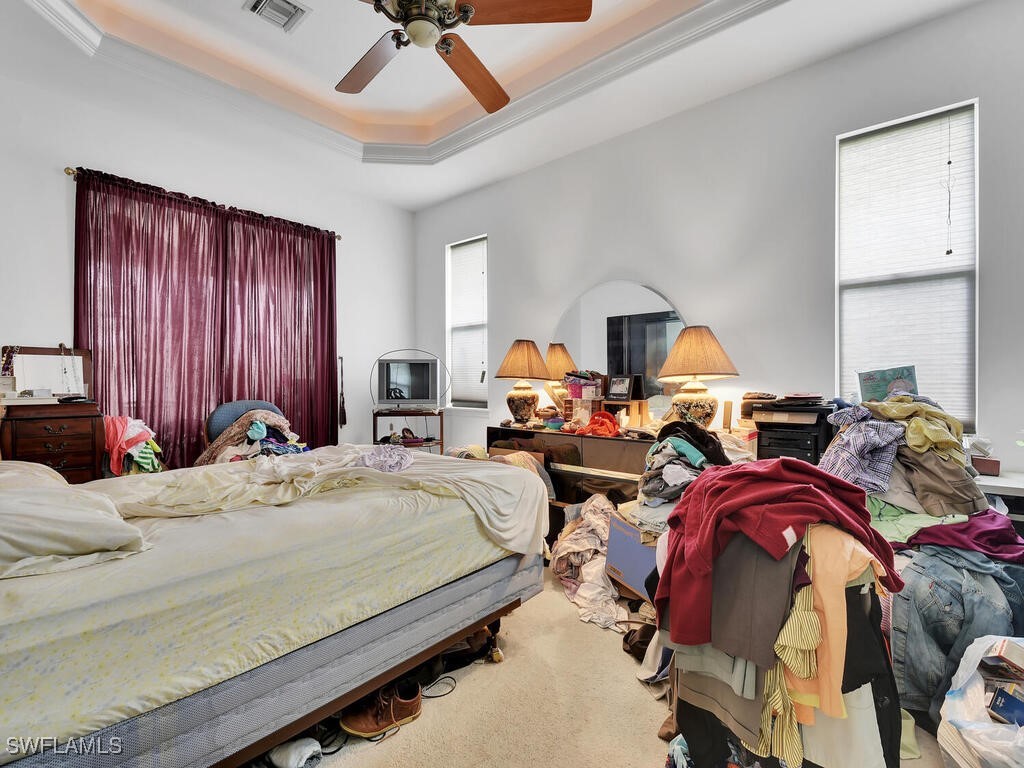 8123 Sandpiper Road Fort Myers, FL 33967 - Photo 17 of 23 a bed room with two bed and a chair