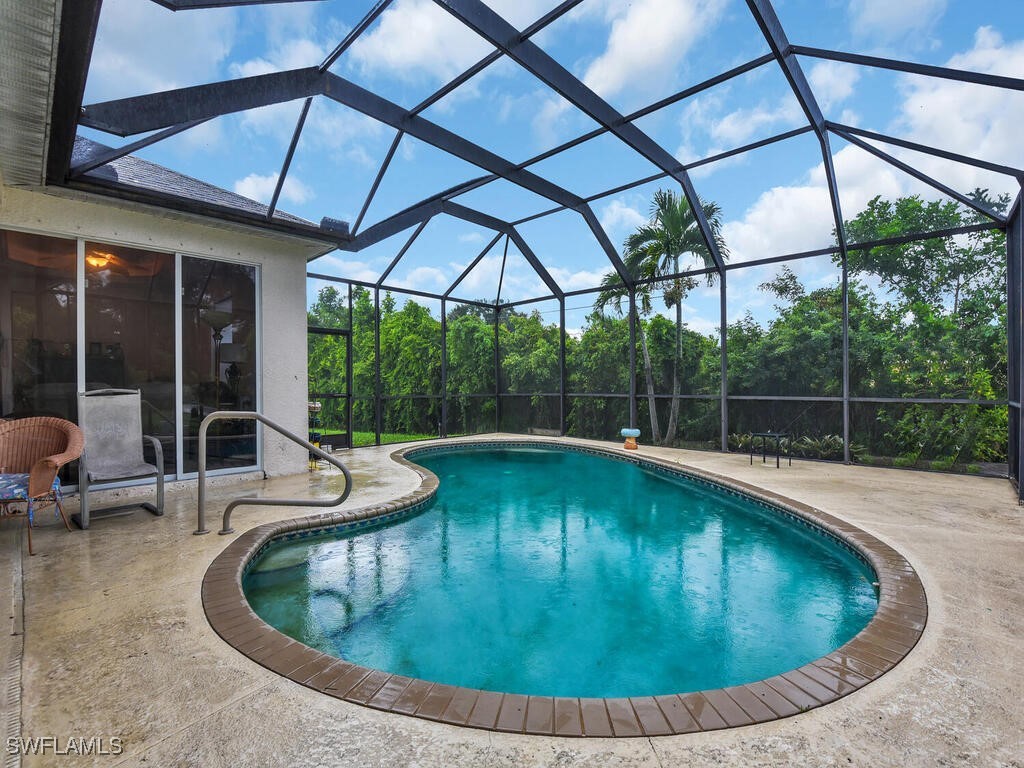 8123 Sandpiper Road Fort Myers, FL 33967 - Photo 23 of 23 a view of swimming pool with outdoor seating