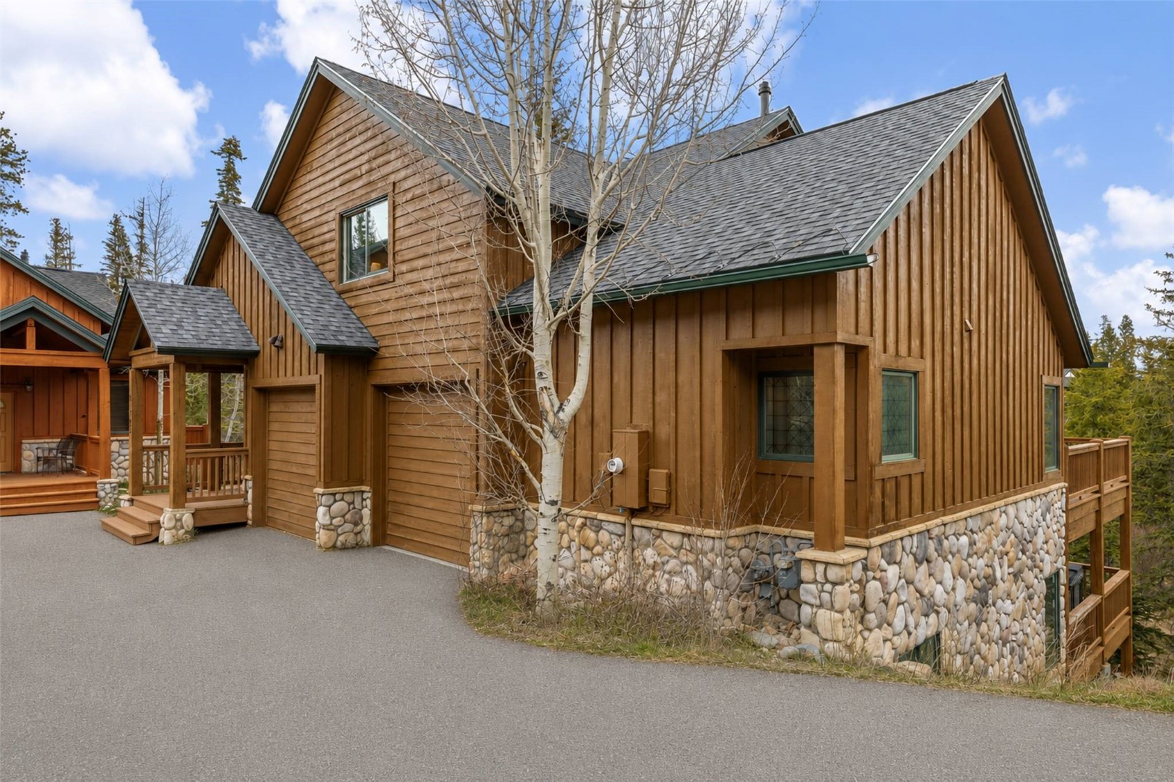 91795 Ryan Gulch Road Silverthorne, CO 80498 - Photo 10 of 50 a view of a house with large windows