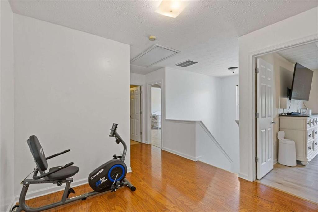 1450 Steam Engine Way Northeast Conyers, GA 30013 - Photo 20 of 33 a view of a room with gym equipment