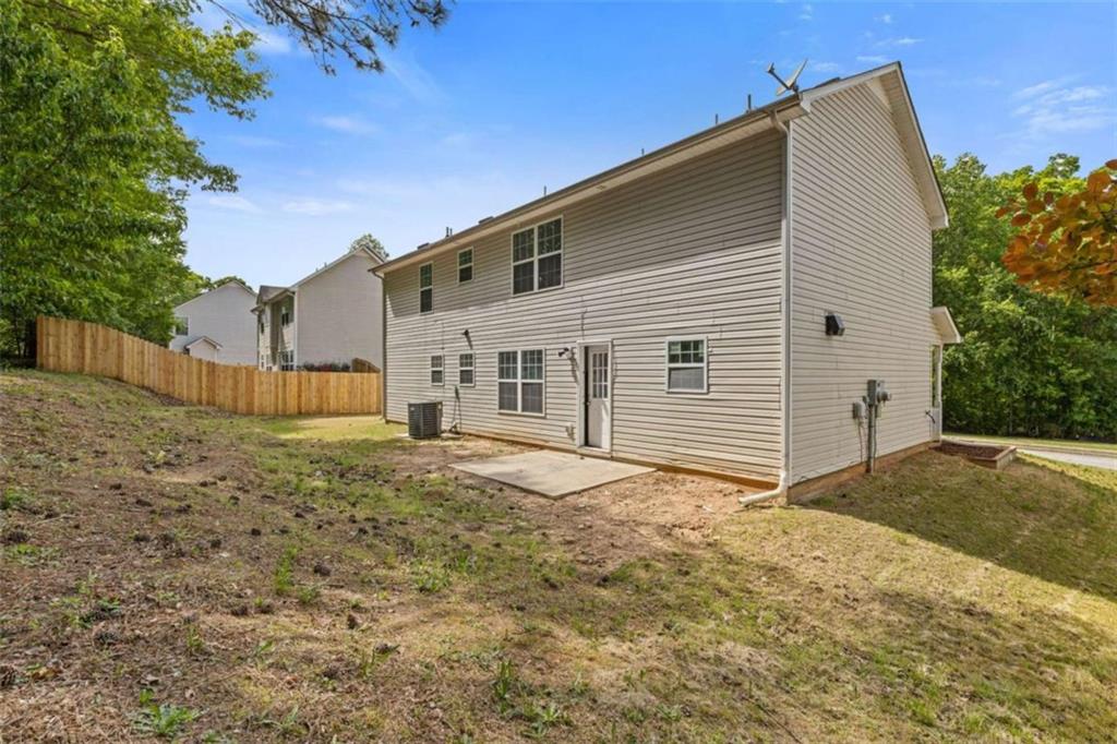 1450 Steam Engine Way Northeast Conyers, GA 30013 - Photo 23 of 33 a backyard of a house