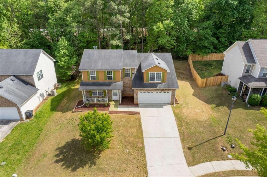 1450 Steam Engine Way Northeast Conyers, GA 30013 - Photo 27 of 33 an aerial view of a house with swimming pool and patio