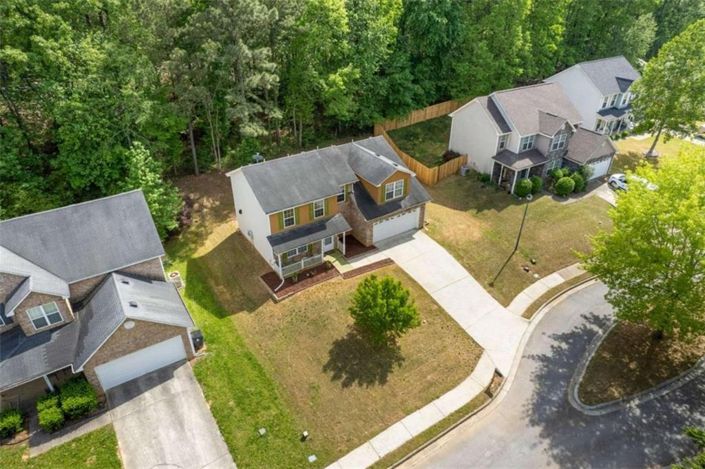 1450 Steam Engine Way Northeast Conyers, GA 30013 - Photo 28 of 33 an aerial view of a house with outdoor space
