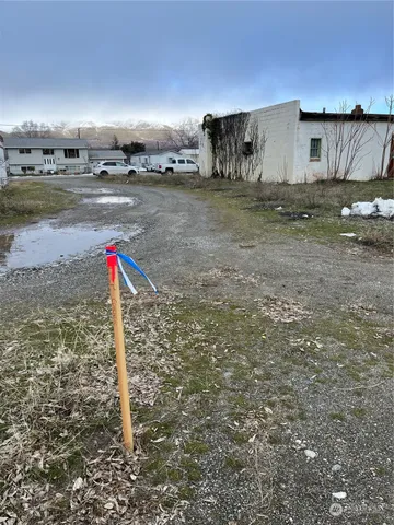 a flag is sitting in the middle of a field