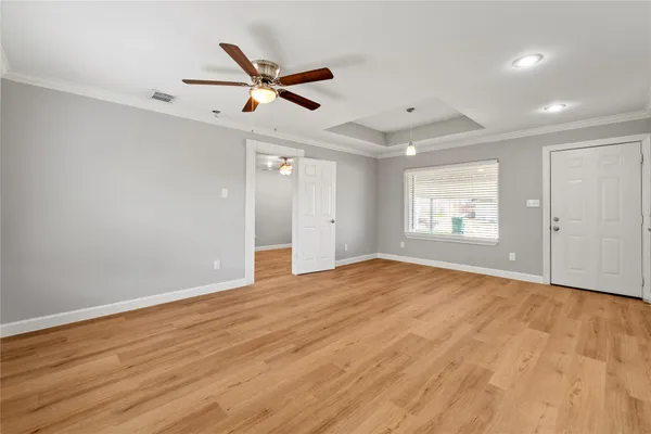 a view of an empty room with a window