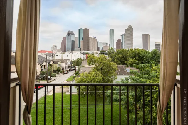 a view of a city from a balcony