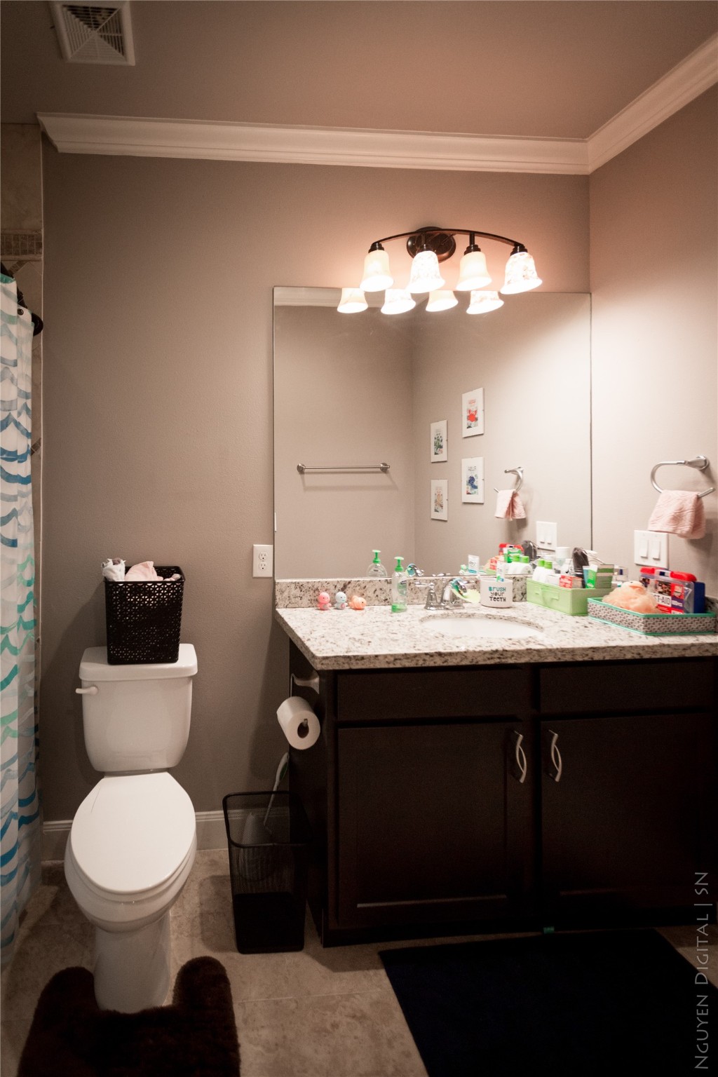 1204 Cushing Street Houston, TX 77019 - Photo 15 of 26 a bathroom with a sink and a mirror