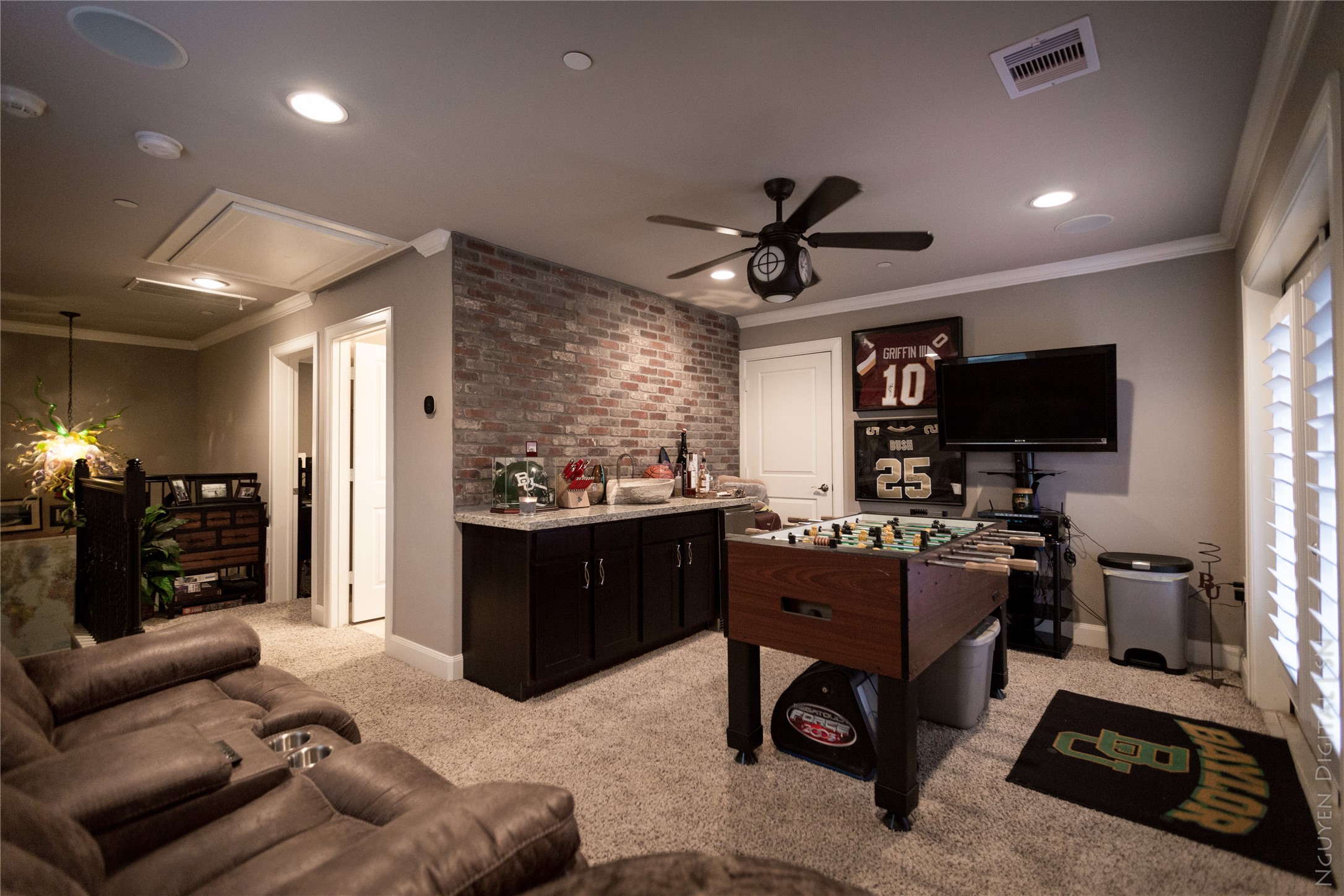 1204 Cushing Street Houston, TX 77019 - Photo 18 of 26 a living room with furniture and a flat screen tv