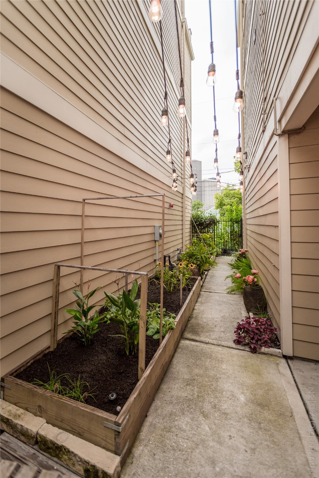 1204 Cushing Street Houston, TX 77019 - Photo 23 of 26 a view of a pathway with a house