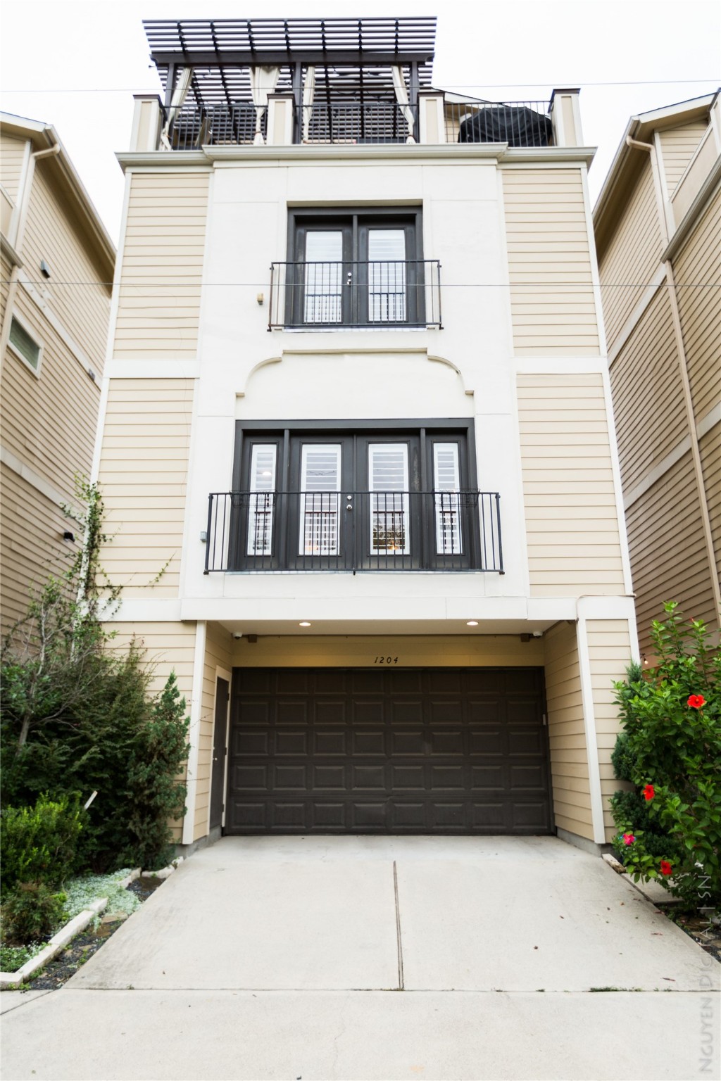 1204 Cushing Street Houston, TX 77019 - Photo 26 of 26 a front view of a house with large windows