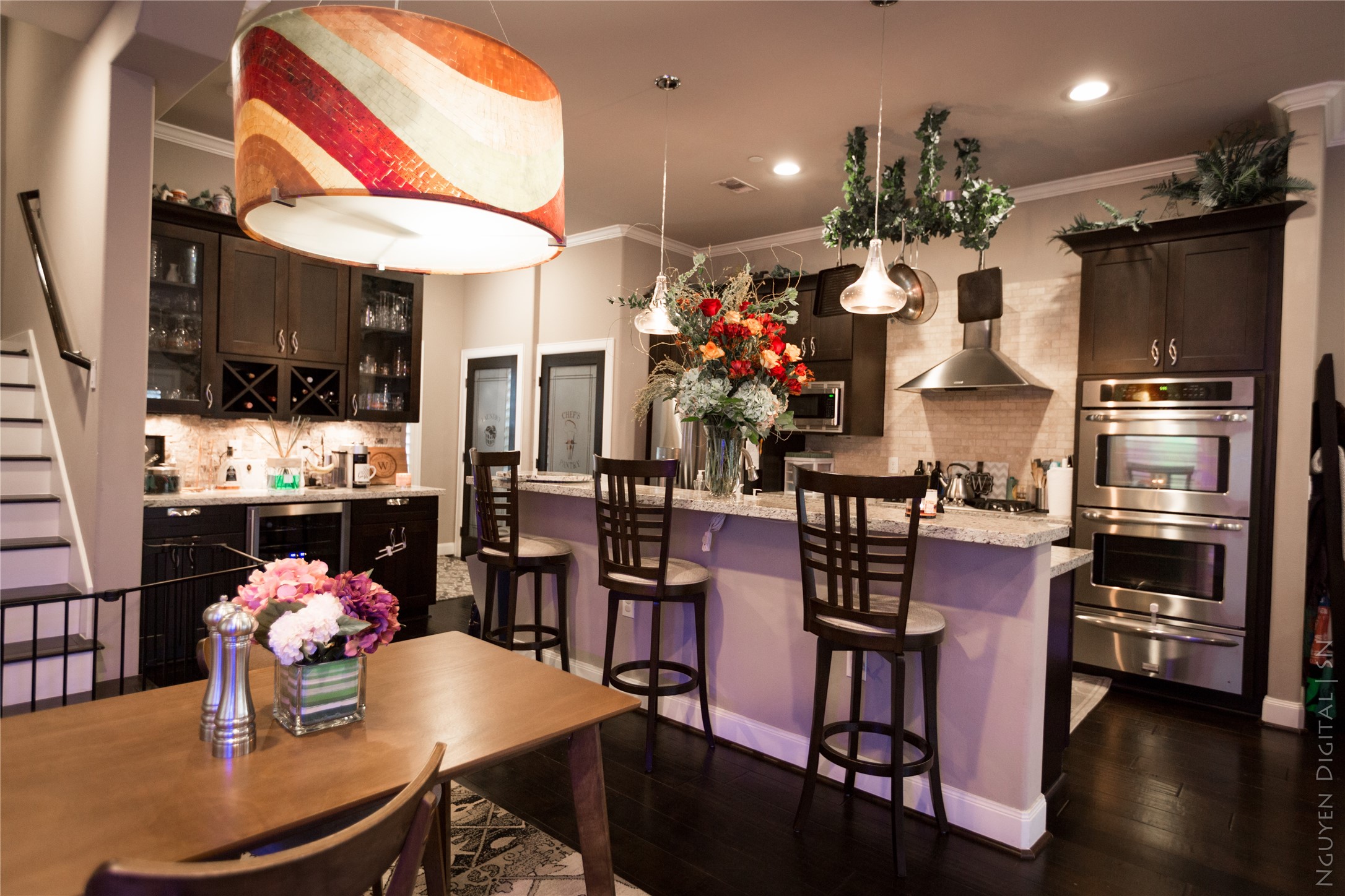 1204 Cushing Street Houston, TX 77019 - Photo 5 of 26 a kitchen with a table and chairs in it