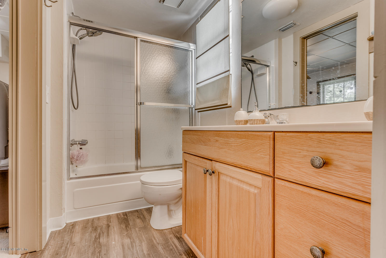 9 Riberia Street St. Augustine, FL 32084 - Photo 23 of 33 a bathroom with a granite countertop sink toilet and shower