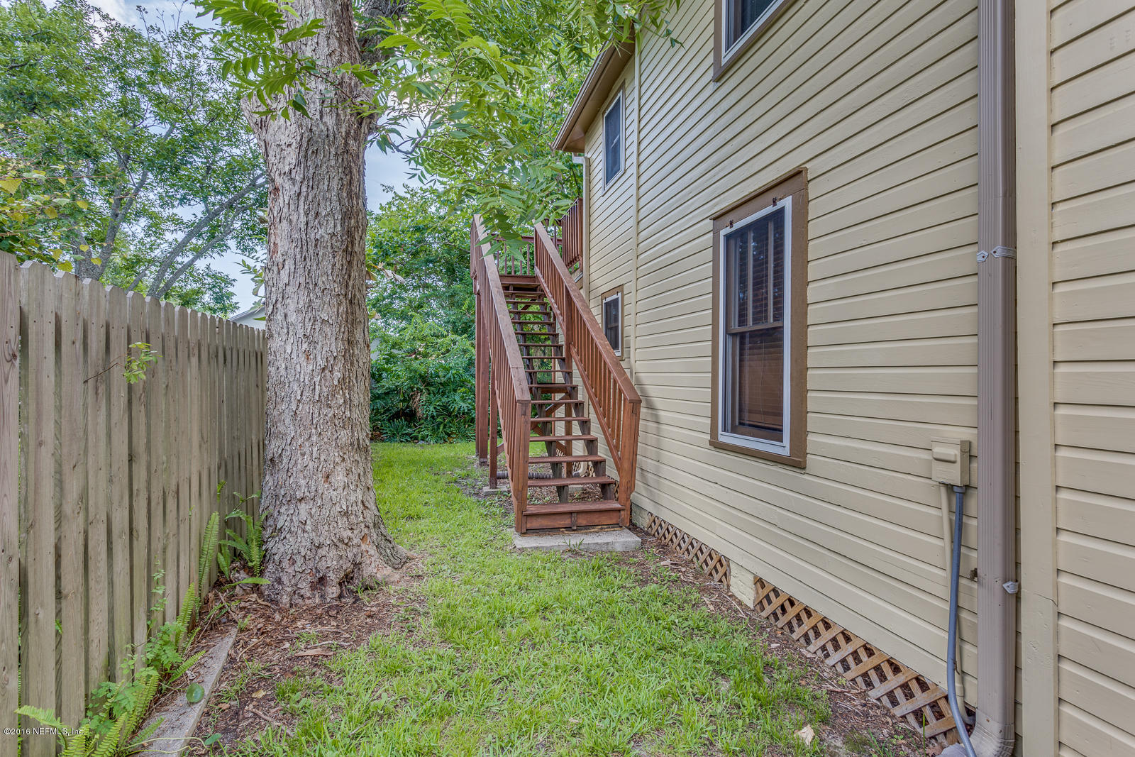 9 Riberia Street St. Augustine, FL 32084 - Photo 27 of 33 a view of a house with a backyard