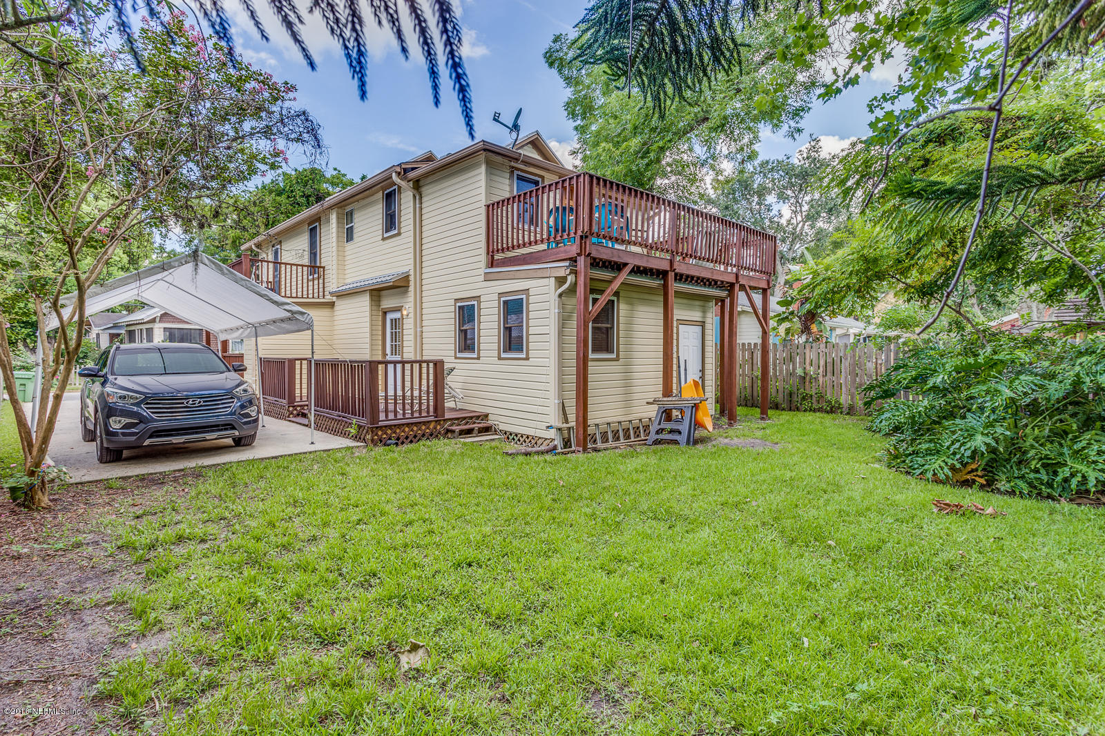 9 Riberia Street St. Augustine, FL 32084 - Photo 29 of 33 a house view with a garden space