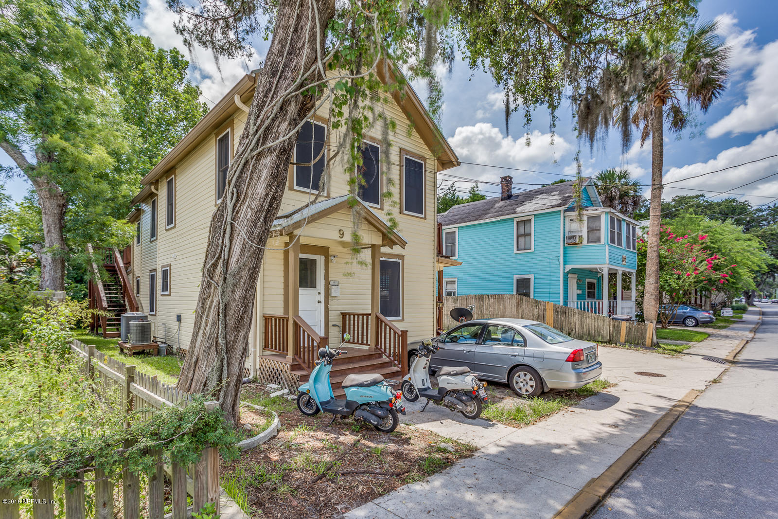 9 Riberia Street St. Augustine, FL 32084 - Photo 33 of 33 a front view of a house with garden