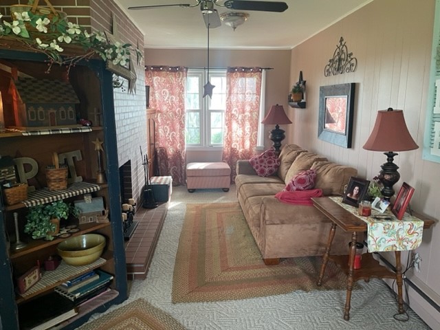 4059 Sunset Road Clinton, IL 61727 - Photo 15 of 55 a living room with furniture and a window