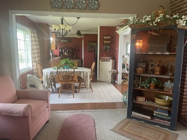 4059 Sunset Road Clinton, IL 61727 - Photo 18 of 55 a living room with furniture and chandelier