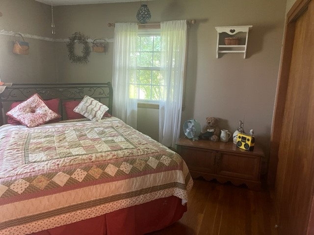 4059 Sunset Road Clinton, IL 61727 - Photo 31 of 55 a bedroom with a bed and window