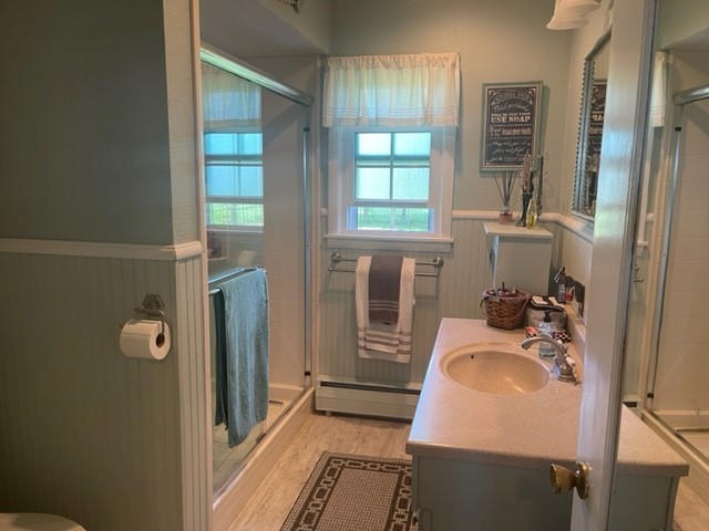 4059 Sunset Road Clinton, IL 61727 - Photo 34 of 55 a bathroom with a sink and a mirror