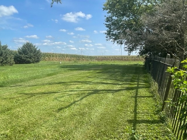 4059 Sunset Road Clinton, IL 61727 - Photo 45 of 55 a view of a lake from a yard
