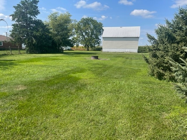 4059 Sunset Road Clinton, IL 61727 - Photo 51 of 55 a view of a big yard with large trees