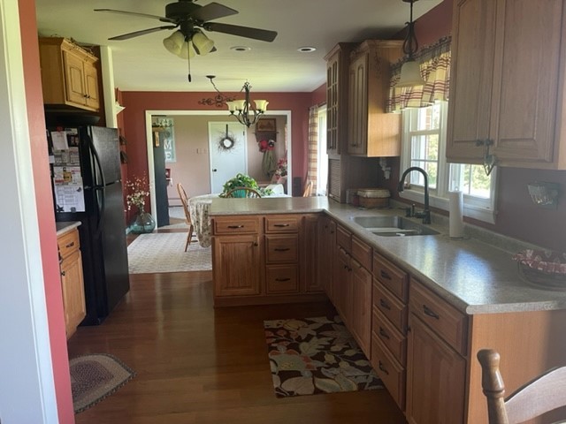 4059 Sunset Road Clinton, IL 61727 - Photo 7 of 55 a kitchen with stainless steel appliances kitchen island granite countertop a refrigerator and a sink