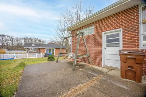 a big yard with table and chairs