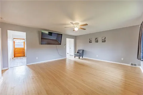 a view of a livingroom with a flat screen tv