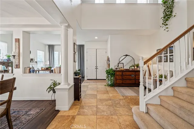 a bathroom with a double vanity sink mirror and bathtub