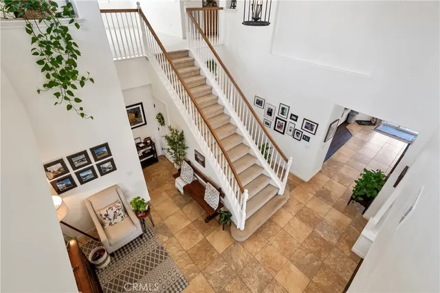 a bathroom with a tub and a window