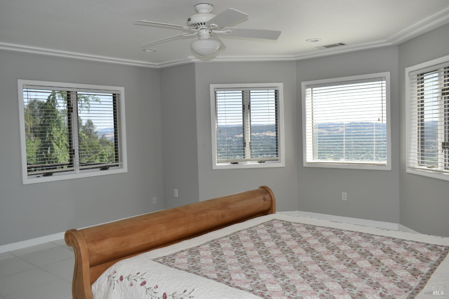 7490 Walnut Lane Lower Lake, CA 95457 - Photo 11 of 21 a bedroom with a bed and a window