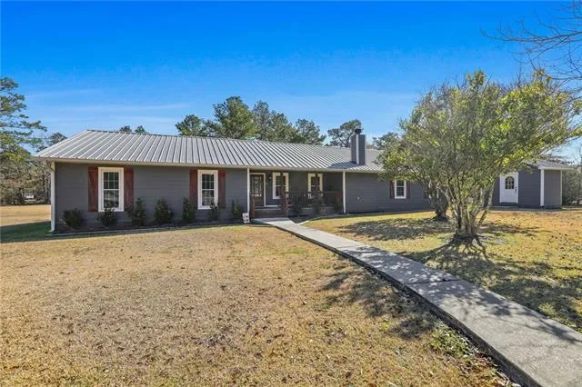 $430,000 | 24450 Jones Road, Springfield, LA 70462