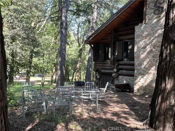 a view of house with a trees