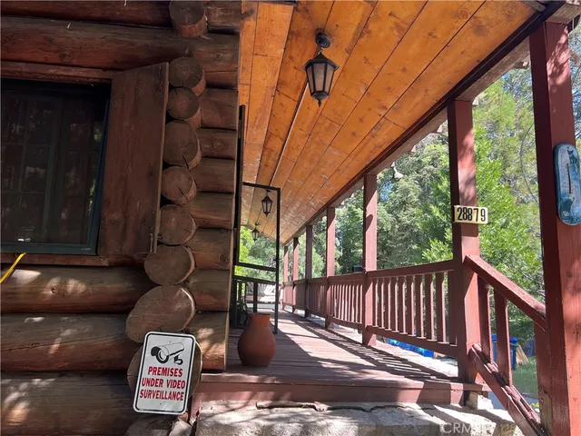 a view of a porch with furniture