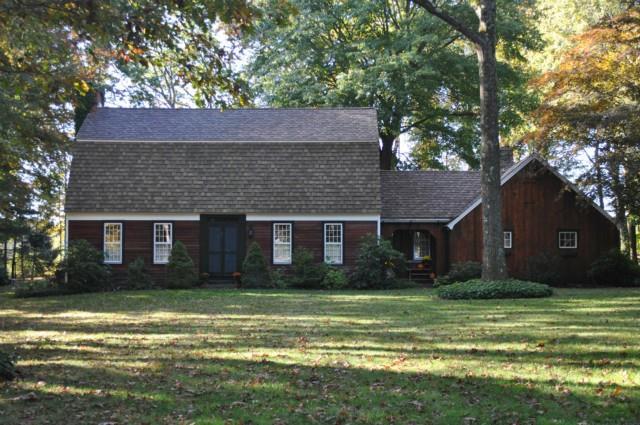 22 Isinglass Terrace Trumbull, CT 06611 - Photo 1 of 1 a brick house with a yard plants and large trees