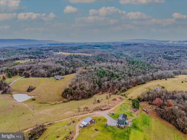 a view of swimming pool and mountain in back