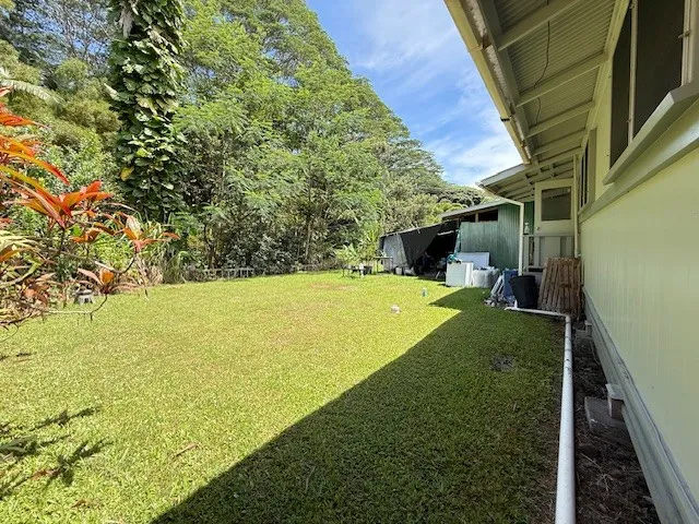 a swimming pool with wooden fence