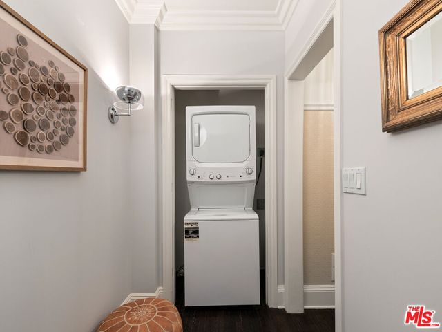 a room that has a bed and a mirror in it