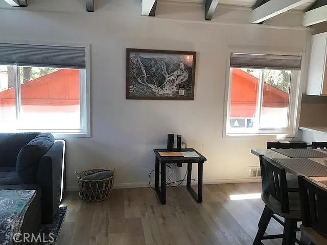 42983 Fern Avenue Big Bear Lake, CA 92315 - Photo 4 of 9 a view of a workspace with furniture and a window