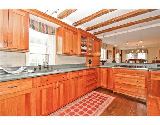 79 Hollow Tree Ridge Road Darien, CT 06820 - Photo 8 of 21 a large kitchen with stainless steel appliances granite countertop a sink and cabinets