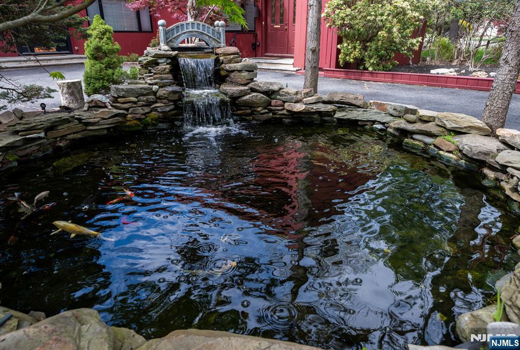 84 Bogerts Mill Road Harrington Park, NJ 07640 - Photo 3 of 47 a view of water fountain in backyard