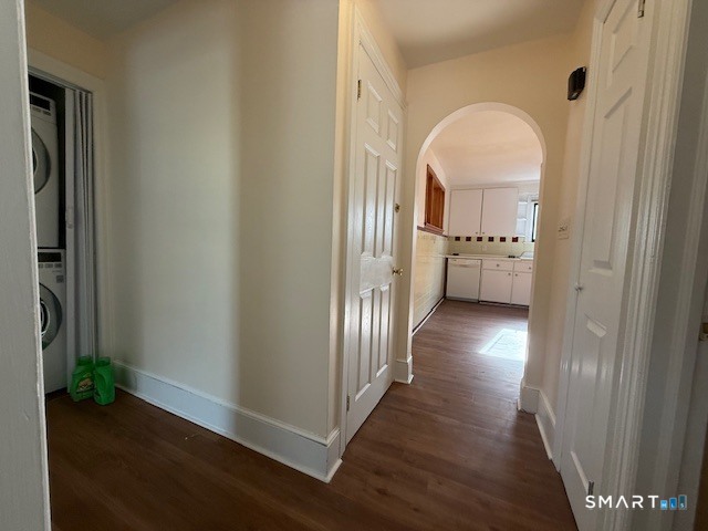 34 New Haven Avenue Waterbury, CT 06708 - Photo 9 of 14 a view of a hallway with wooden floor and a bathroom